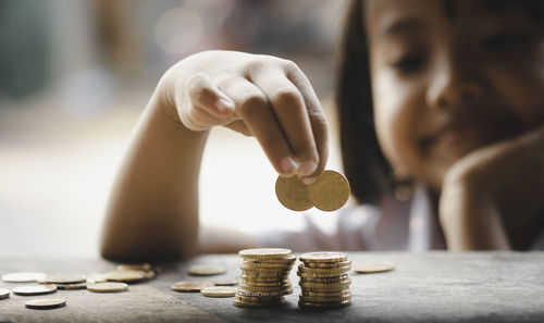 Close-up of coins on table