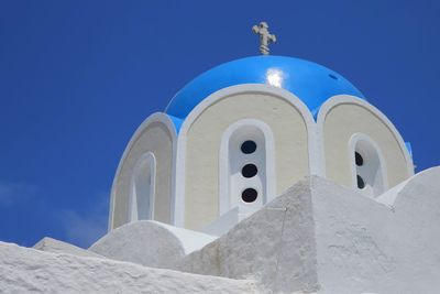 Low angle view of church against clear blue sky