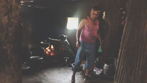 Man standing in corridor