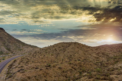 Scenic view of landscape against sky during sunset