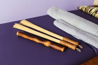 The therapeutic massage bamboo tool set of different spa equipment