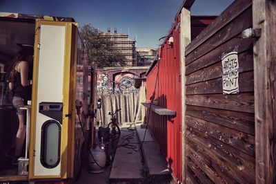 Buildings against blue sky and clouds