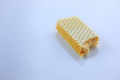 Close-up of cake against white background