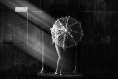 Low section of woman standing on floor