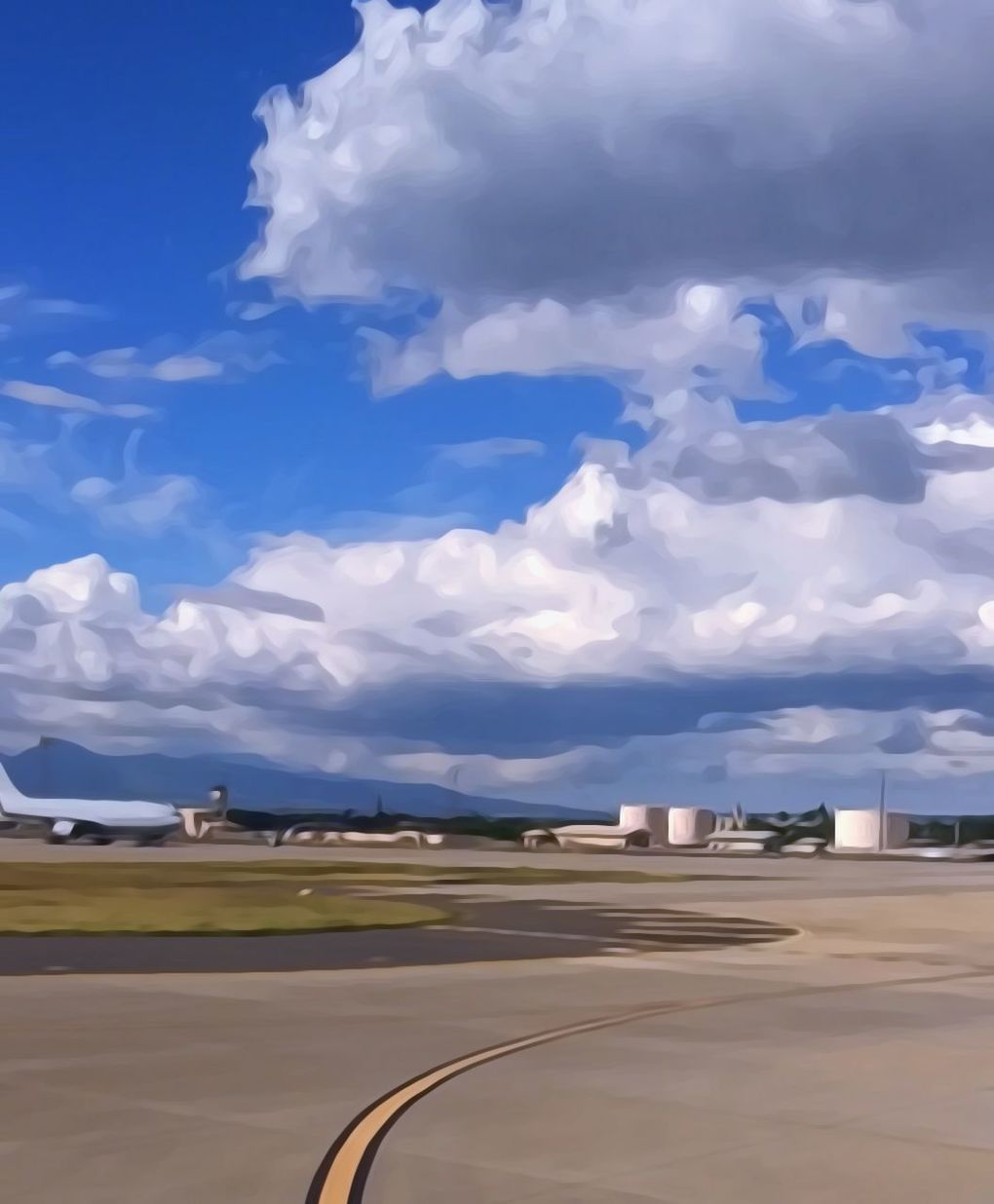 cloud - sky, sky, transportation, no people, mode of transportation, airport, day, airport runway, air vehicle, road, airplane, nature, outdoors, blue, sunlight, architecture, travel, built structure, building exterior, land vehicle, airport terminal