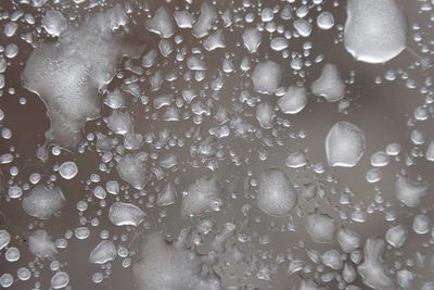 Full frame shot of wet bubbles in sea