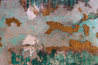 Abstract wall background, various old oil paints on the wall, beautiful texture