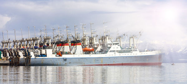 Fishing seiners near the pier in avacha bay in kamchatka in soft diffused light