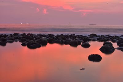 Scenic view of sea against sky during sunset