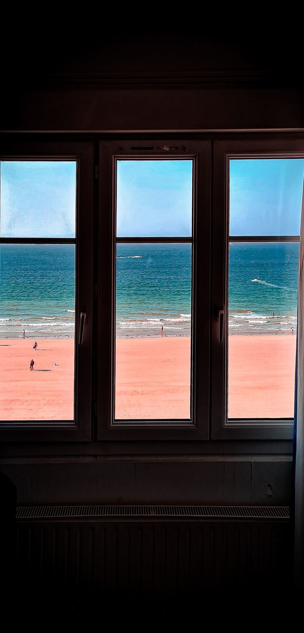 VIEW OF SEA THROUGH WINDOW