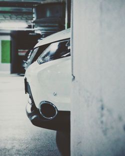 Close-up of car on road