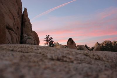 Scenic view of rock formation against sky during sunset