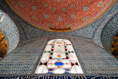 Low angle view of mosaic ceiling