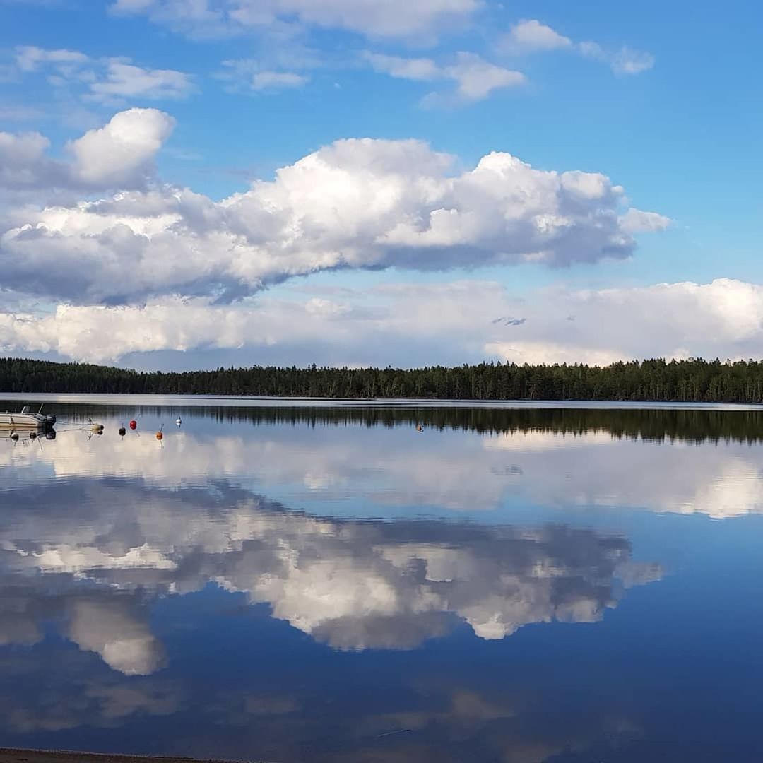 cloud - sky, sky, reflection, tranquility, scenics - nature, water, beauty in nature, lake, tranquil scene, nature, waterfront, symmetry, no people, idyllic, day, non-urban scene, outdoors, blue, plant, reflection lake