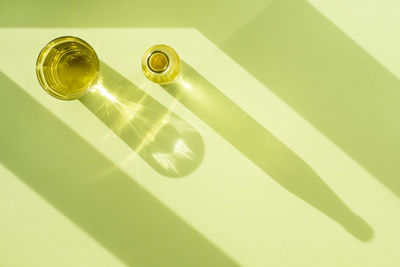 High angle view of drink glass on table