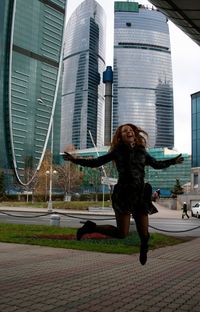 Woman jumping in the city