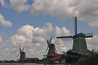 Traditional windmill against sky