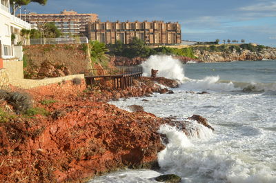 Waves rushing on rocky coastline