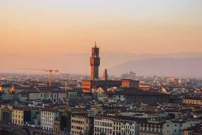 High angle view of city at sunset