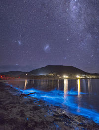 Scenic view of sea against sky at night