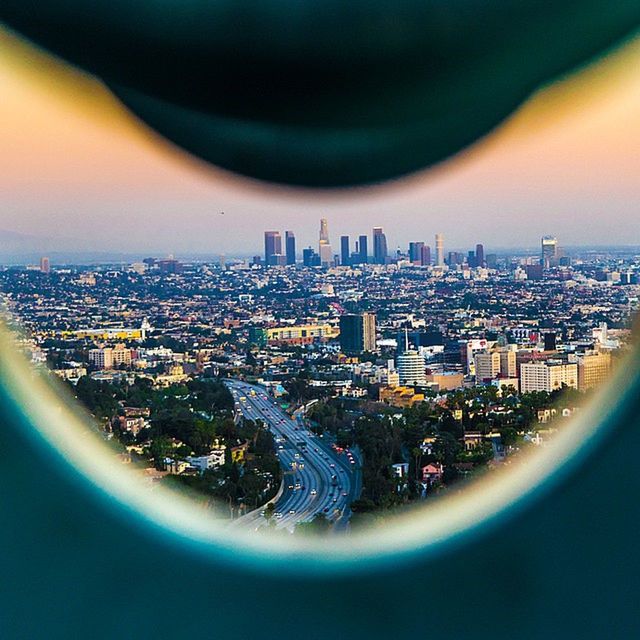 cityscape, architecture, city, built structure, building exterior, illuminated, sky, crowded, aerial view, night, high angle view, residential district, sunset, modern, capital cities, city life, residential building, cloud - sky, travel destinations, no people