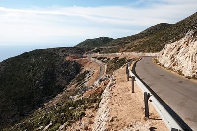 Scenic view of mountain road against sky