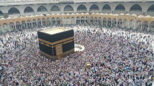 High angle view of group of people in front of building