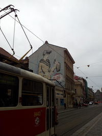 Train on road against sky