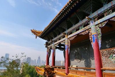 Low angle view of temple building against sky