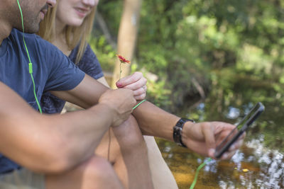 Close-up of hands holding water