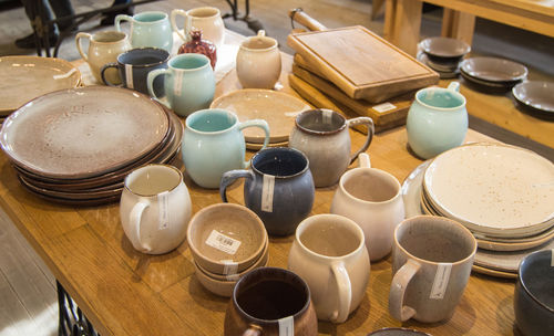 High angle view of coffee cups on table