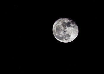 Low angle view of full moon in sky