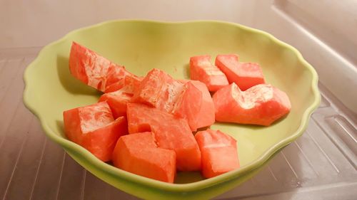 High angle view of fruits in plate on table