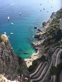 High angle view of sea against blue sky