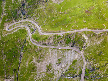 Winding road aerial view by drone. sibiu, romania. a great place to drive and stop during a trip.