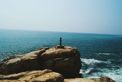 Scenic view of sea against clear sky