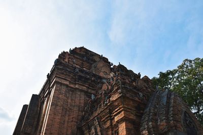 Low angle view of old building against sky
