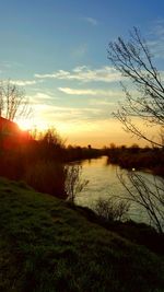 Scenic view of landscape against sky during sunset