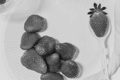 Close-up of blackberries in container on table