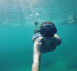 Man swimming in sea