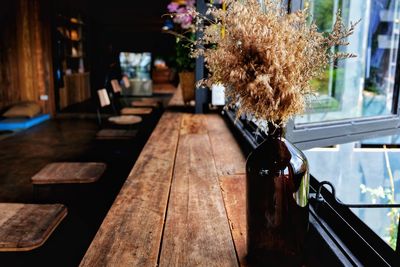 Flower vase on table