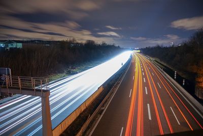 High angle view of light trails on highway