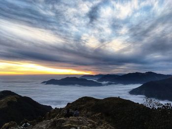 Scenic view of sea against sky at sunset