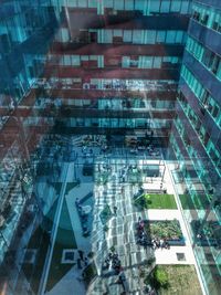 High angle view of people on illuminated city