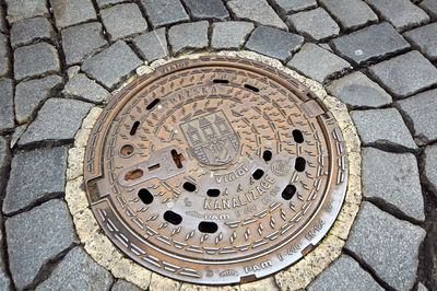 High angle view of manhole on street