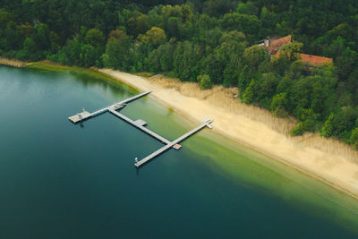 High angle view of lake against trees