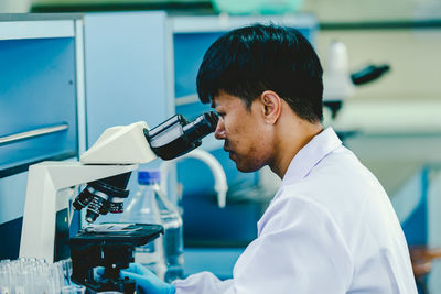 Young scientist working in the laboratory