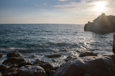 Scenic view of sea against sky during sunset