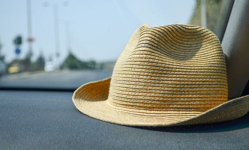 Close-up of hat on dashboard