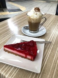 Ice cream and coffee in glass on table